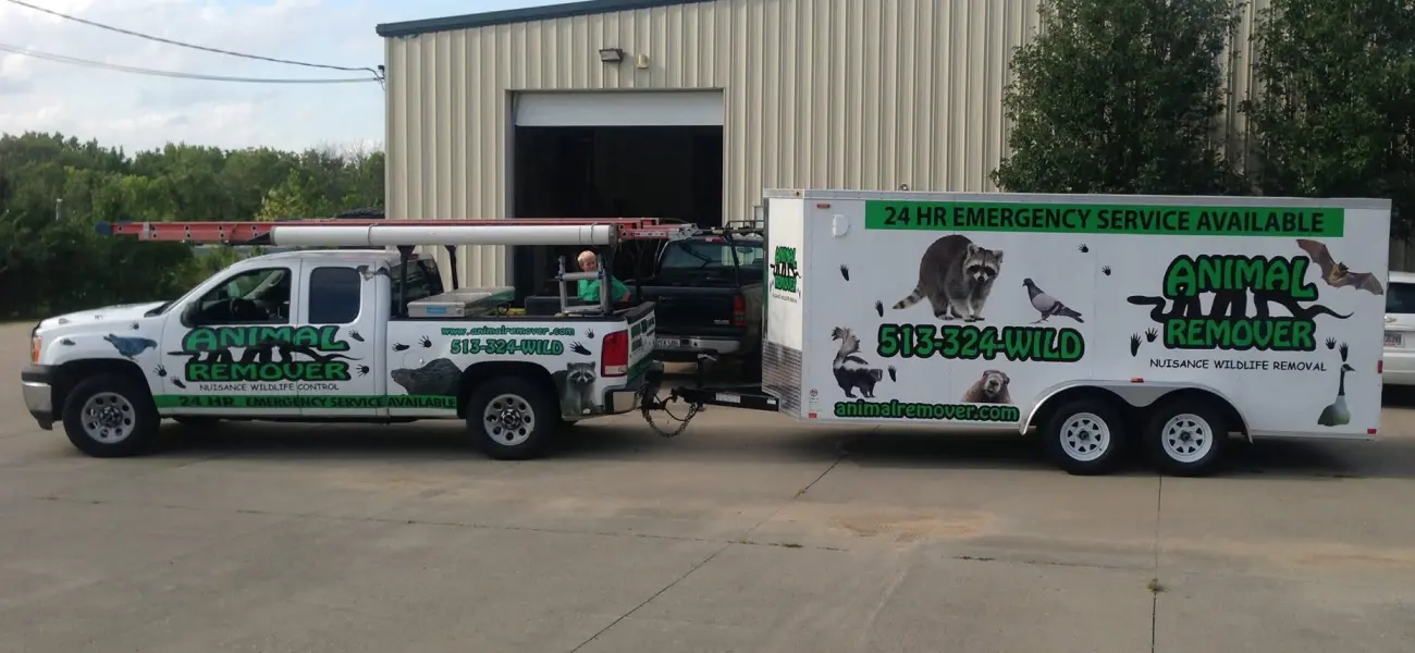 Animal Remover technicians preparing service truck and trailer for wildlife control and removal in Ohio