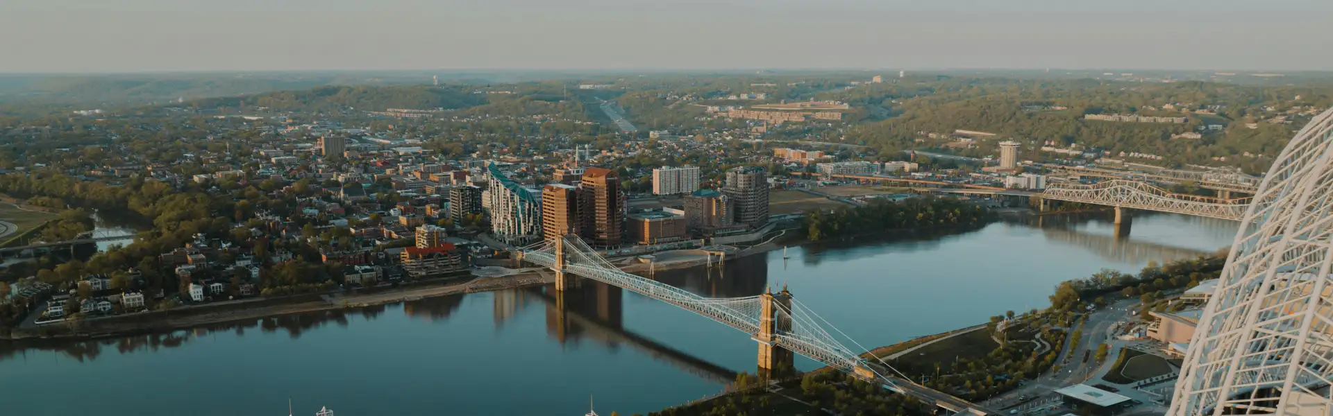 Downtown Cincinnati with view of bridges. Animal Removal serves Cincinnati, Northern KY, Hamilton, Oxford, & Dayton.
