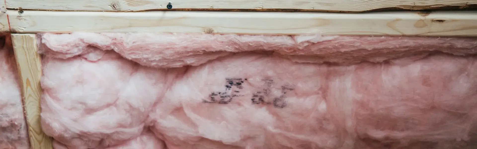 Pink insulation in a modern home. Call or contact Animal Remover for insulation removal services in Cincinnati.