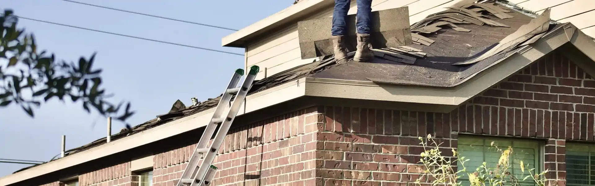 A roof in the process of being repaired. Call or contact Animal Remover in Cincinnati for roofing repairs.