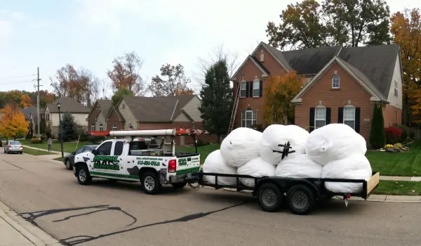 Animal Remover service truck hauling away debris after a repair job. Animal Remover is the leading wildlife removal provider in Cincinnati, OH.